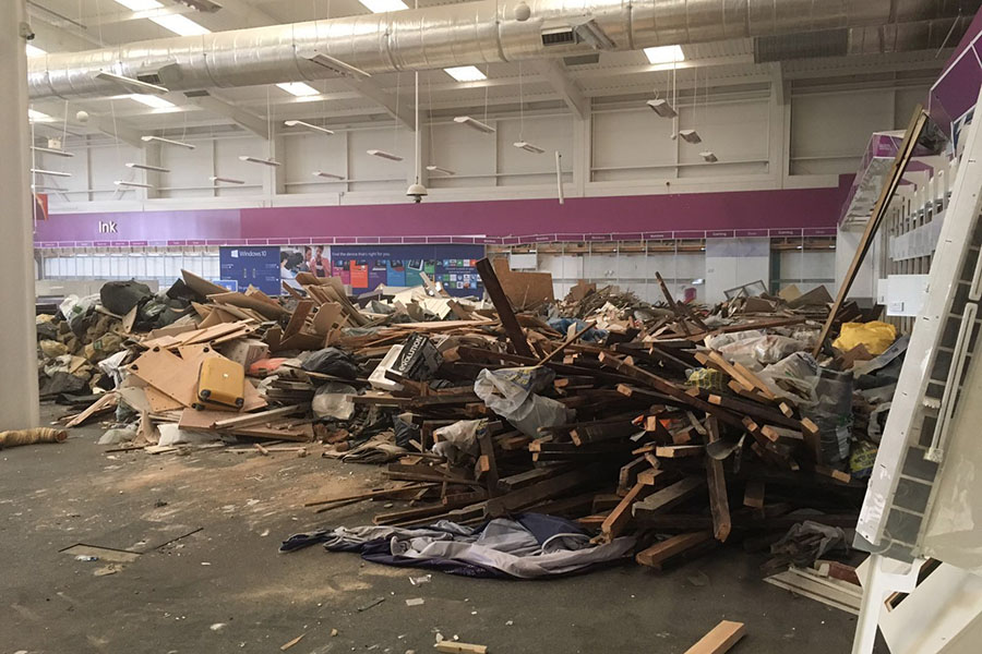 Rubbish that has been dumped inside a warehouse waiting for collection