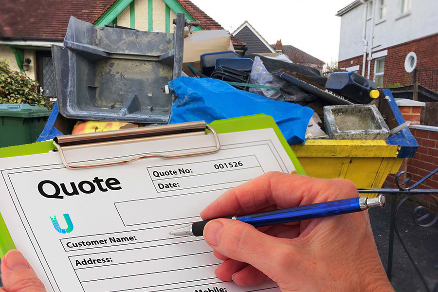 A hand writing a quote with a pencil in front of a house with a skip outside